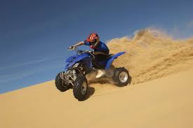 Renting a quad bike in Tamraght for an adventure tour in the Moroccan desert
