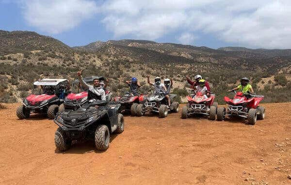 Guided quad Bike in Tamraght with expert guide leading through dunes