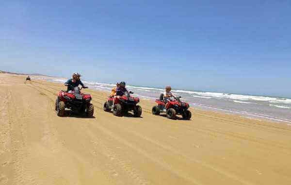 Guided quad biking tour through the desert dunes of Tamraght