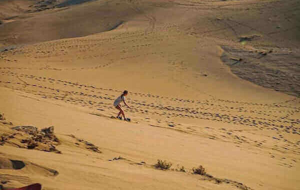 Sandboarding in Agadir with stunning dune views