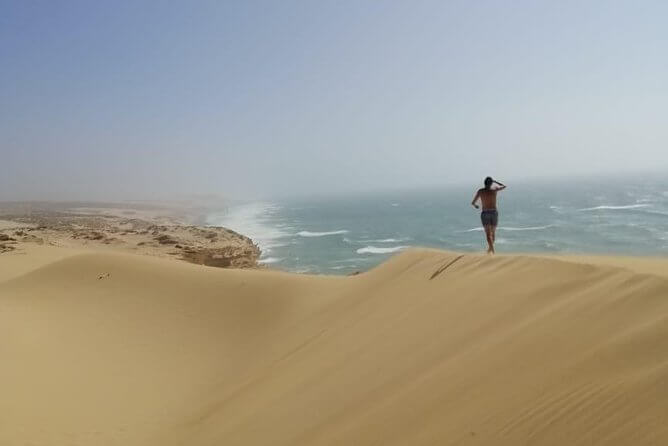 Sandboarding from Marrakech dunes – Thrilling adventure experience.