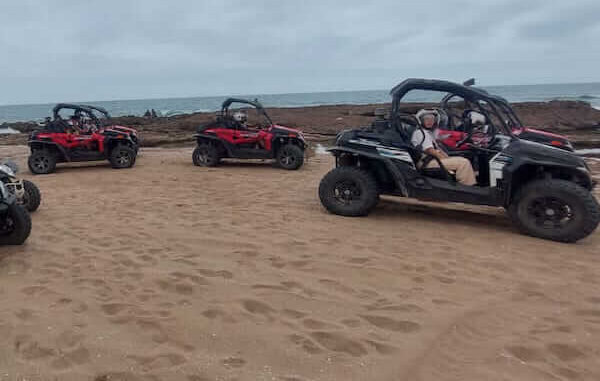 Buggies racing through the desert landscape in Agadir.