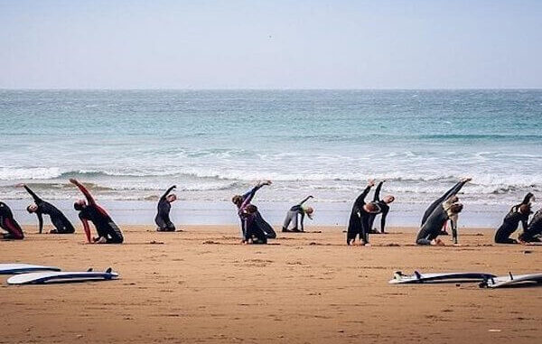 Surfboards lined up on the sand at Agadir beach