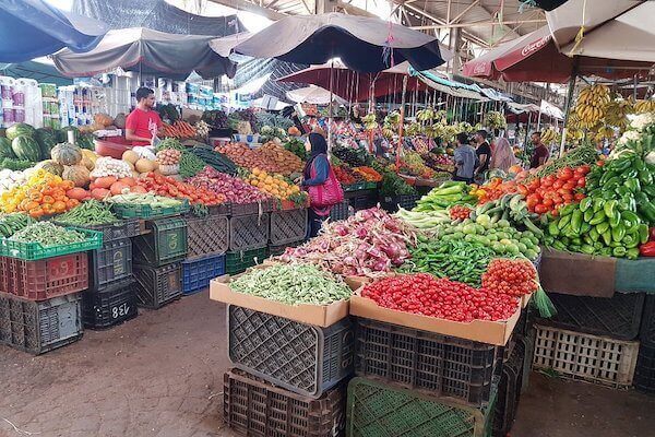 Tourists exploring Souk El Had market in Agadir