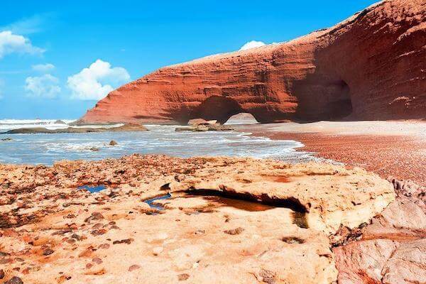 Relax and sunbathe at Legzira Beach Morocco