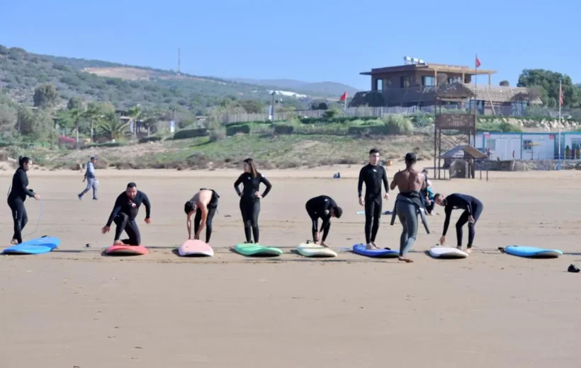 Colorful surfboards lined up on Taghazout beach