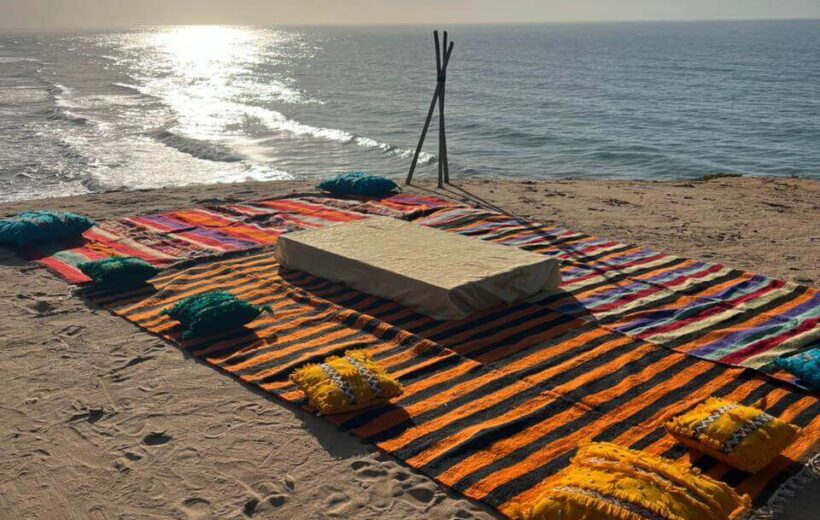 Travelers enjoying a sunset desert trip from Taghazout