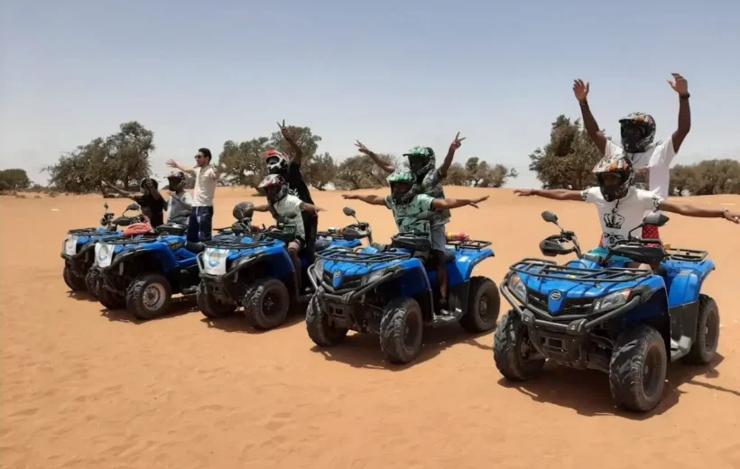 Group on an Agadir quad bike tour exploring the dunes