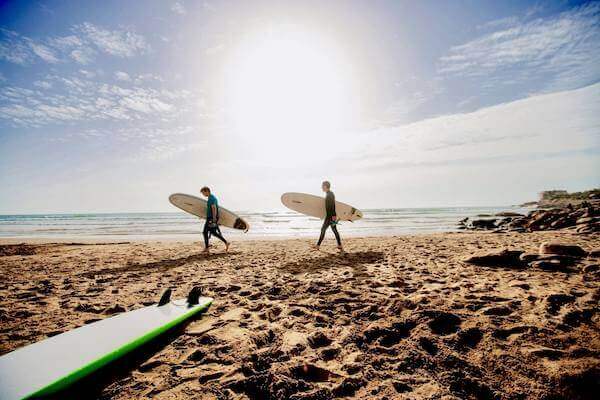 Beginner learning to surf in Taghazout Morocco